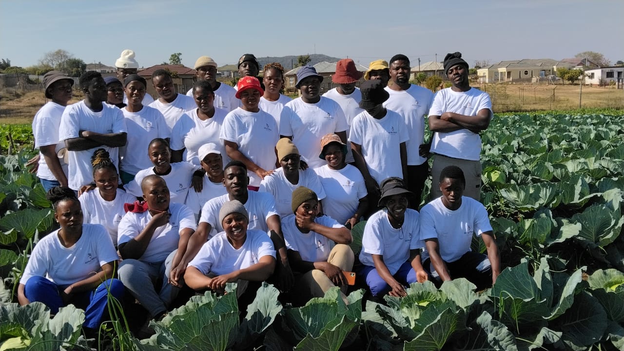 Masutha Farming team in a cabbage field